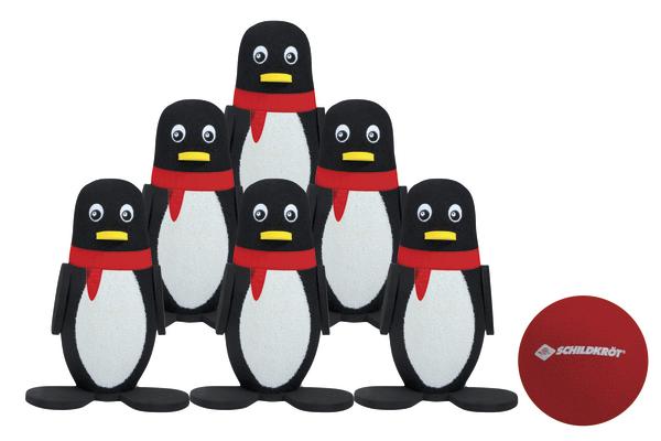 Fünf schwarze Pinguin-Bowlingfiguren mit roten Schals und roter Bowlingkugel von Schildkröt.