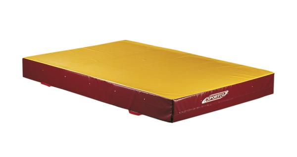 Weicher Turnmatten-Schutz mit gelber Oberfläche und rotem Rand für Sport und Gymnastik.