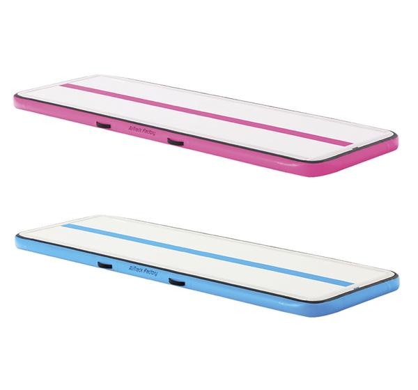 Pinke und blaue aufblasbare Airtrack Turnmatte für Gymnastik und Training.