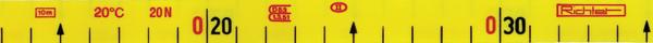 Nahaufnahme eines gelben Messinstruments mit Temperatur- und Kraftskalen.