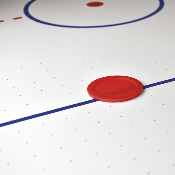 Luft-Hockey-Tisch mit rotem Schläger auf weißer Spielfläche und blauen Linien.