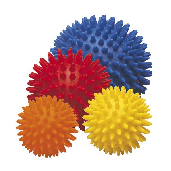 Vier bunte Igelbälle in Blau, Rot, Orange und Gelb mit Noppen für Massage und Therapie.